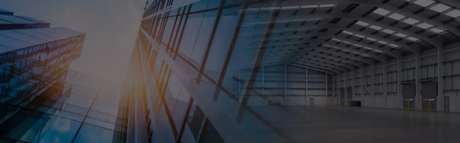 Glazed office building looking up - Services page hero